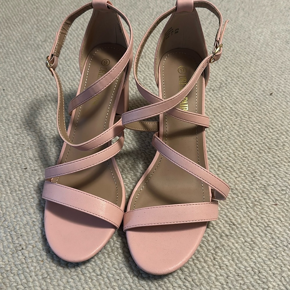 Pink strappy heeled sandals